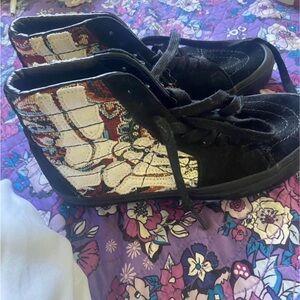 Black High-Top Canvas Sneakers with White Graphic Panel skull vans